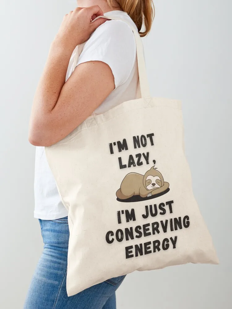

I'm not lazy, IM just conserving energy - funny t-shirt for smart lazy people Tote Bag tote bag university tote bag men's
