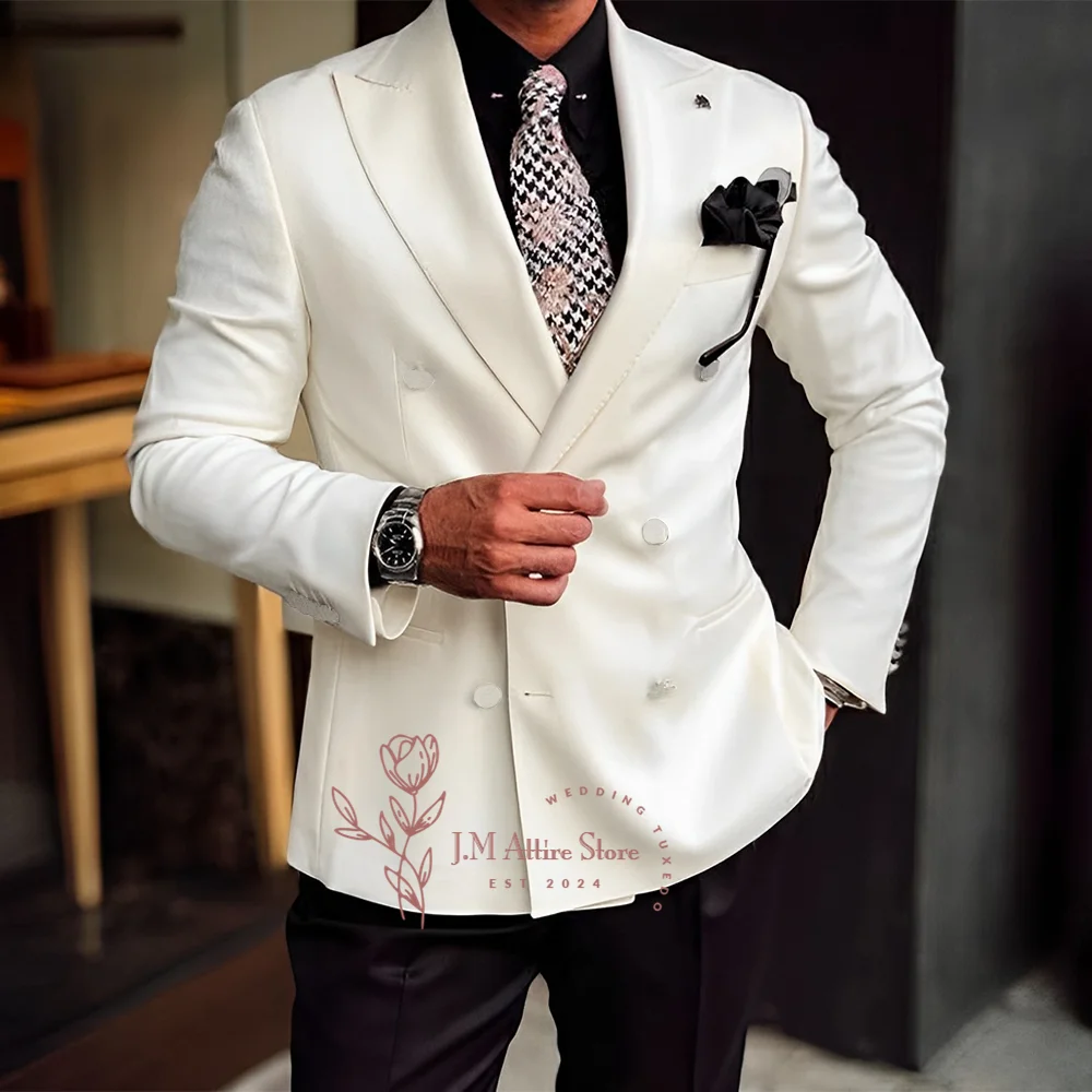 

Elegant ivory men's 2-piece suit peak lapel double breasted jacket and black pants custom tuxedo for wedding groom party attire