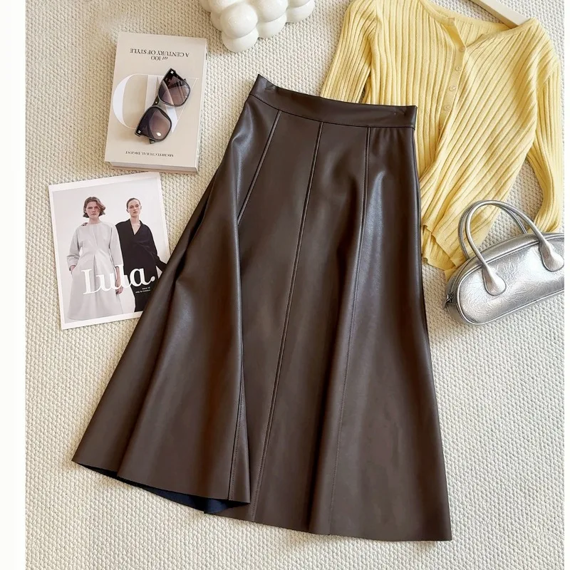 2025 Autunno Inverno Donna Elegante PU Pelle Gonna nera Pianura Ufficio Donna Slim Gonne a vita alta Temperamento Gonna di media lunghezza