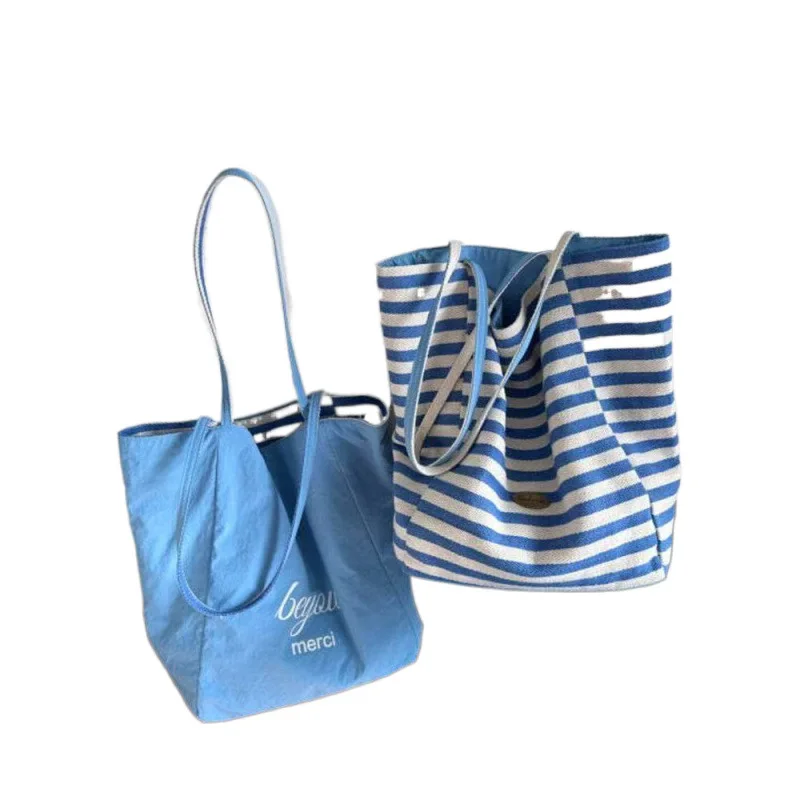 Большая двусторонняя большая сумка-тоут One Pack и Two Backs AB, синяя морская соляная сумка 2025 года. Действительно на ощупь, универсальная пригородная нишевая сумка на каждый день.