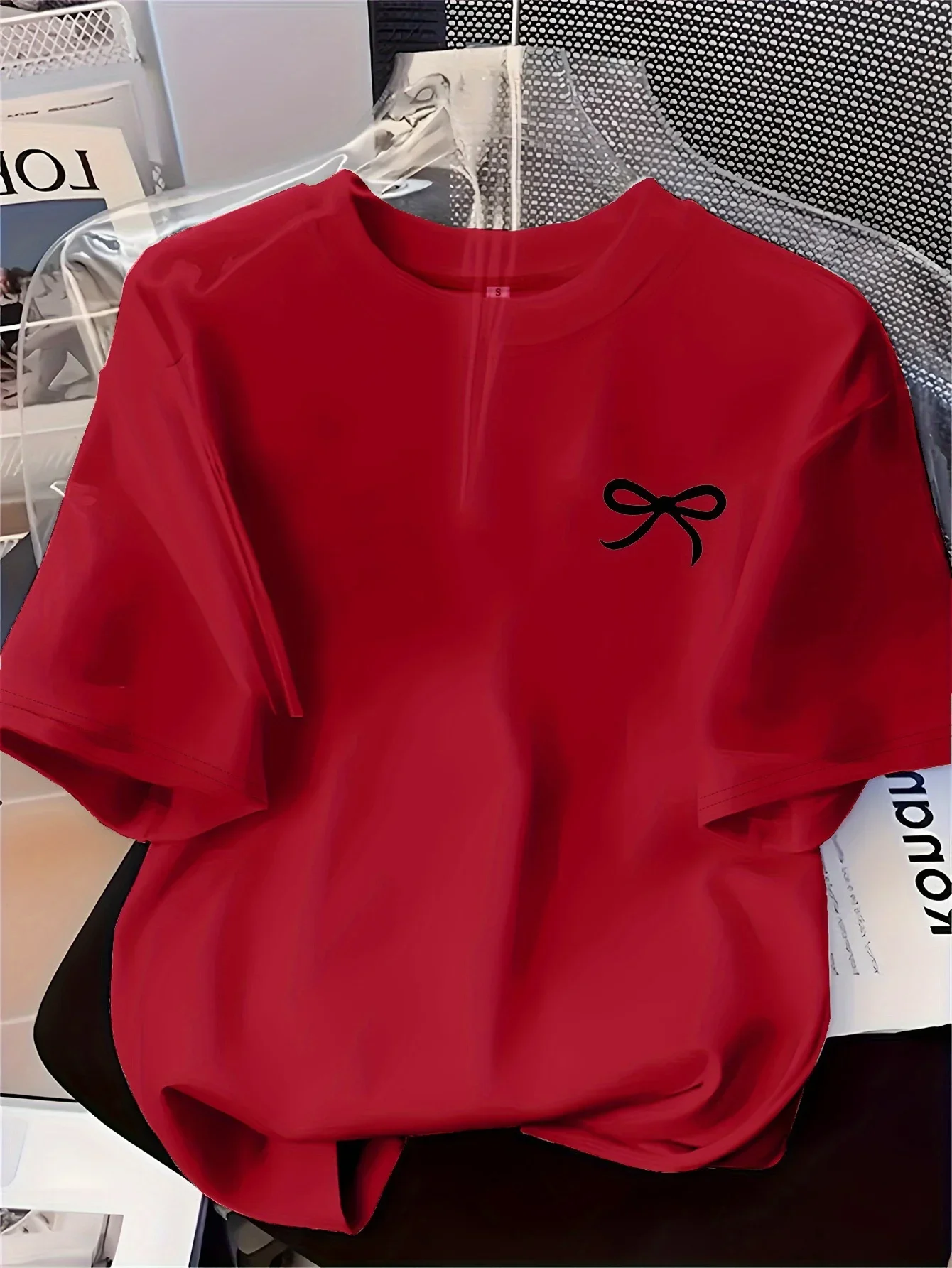 Nueva camiseta para mujer con estampado de lazo negro, estilo sencillo, informal, a la moda, camiseta de manga corta, ropa suave y cómoda de verano para mujer