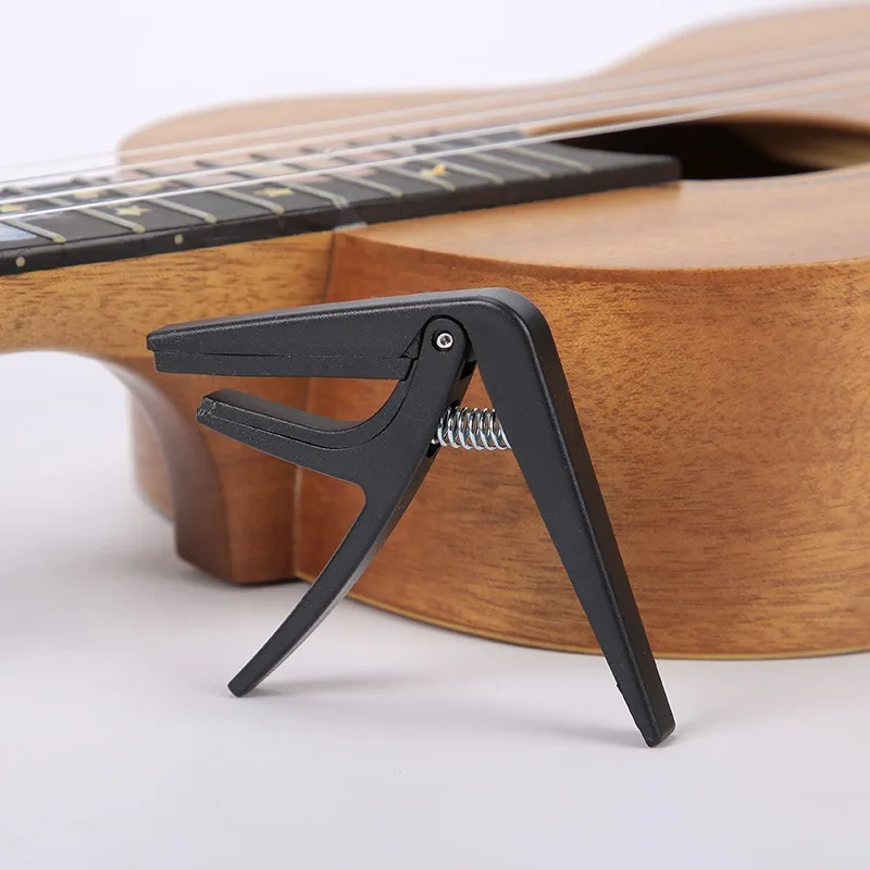 Factory Wholesale Ukulele Capo Quick Change Uke Capo Guitar Accessories Clip for Soprano Concert Tenor