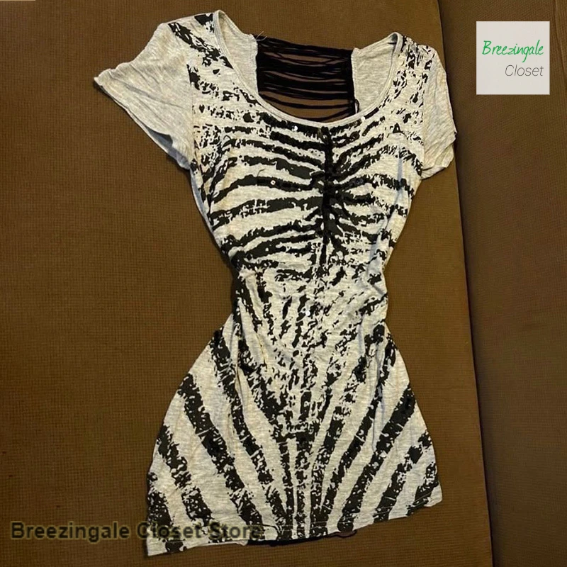 

American style retro grey halter dress female summer new fashion rock dark wind spell tassels Joker casual Joker bag hip skirt.