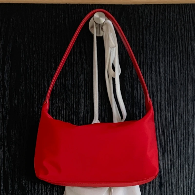 

Новая модная женская сумка из нейлона на весну/лето 2026 года, однотонная, маленькая, с верхней ручкой, для повседневного использования, универсальная, легкая