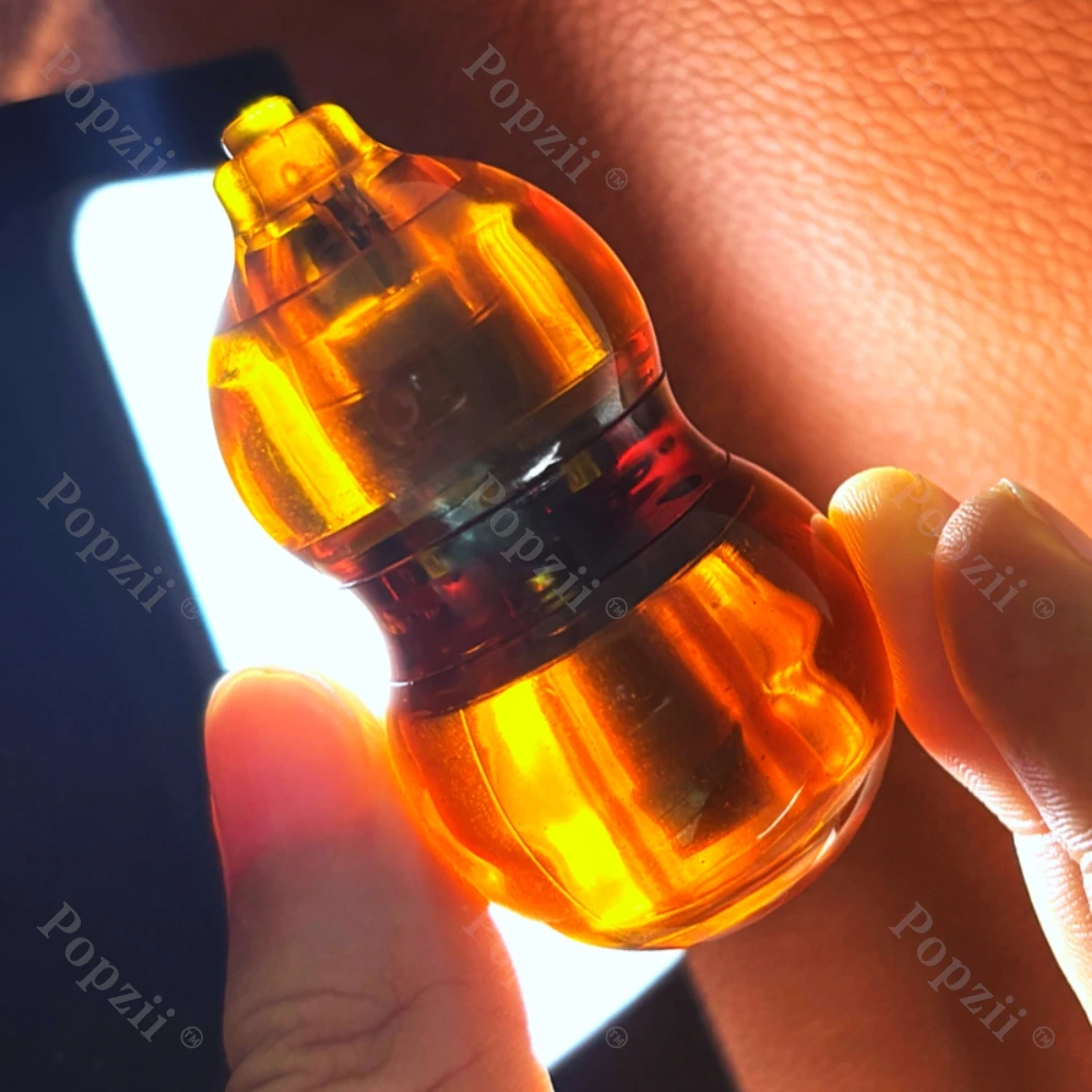 ของเล่นบีบแก้เครียดแบบหมุนได้ รูปทรงน้ำเต้า PEI EDC พร้อมฟังก์ชั่นกดเหรียญ ช่วยลดความวิตกกังวล