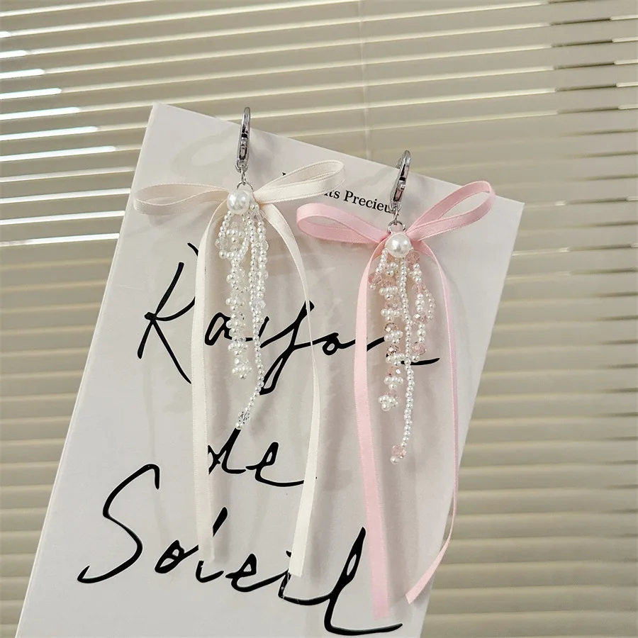 

Y2K Розовый брелок для телефона с бантиком для девочек и жемчужной бусиной, милые подвески в виде каваи, подвеска для школьной сумки, iP 12, книги, CCD-камера