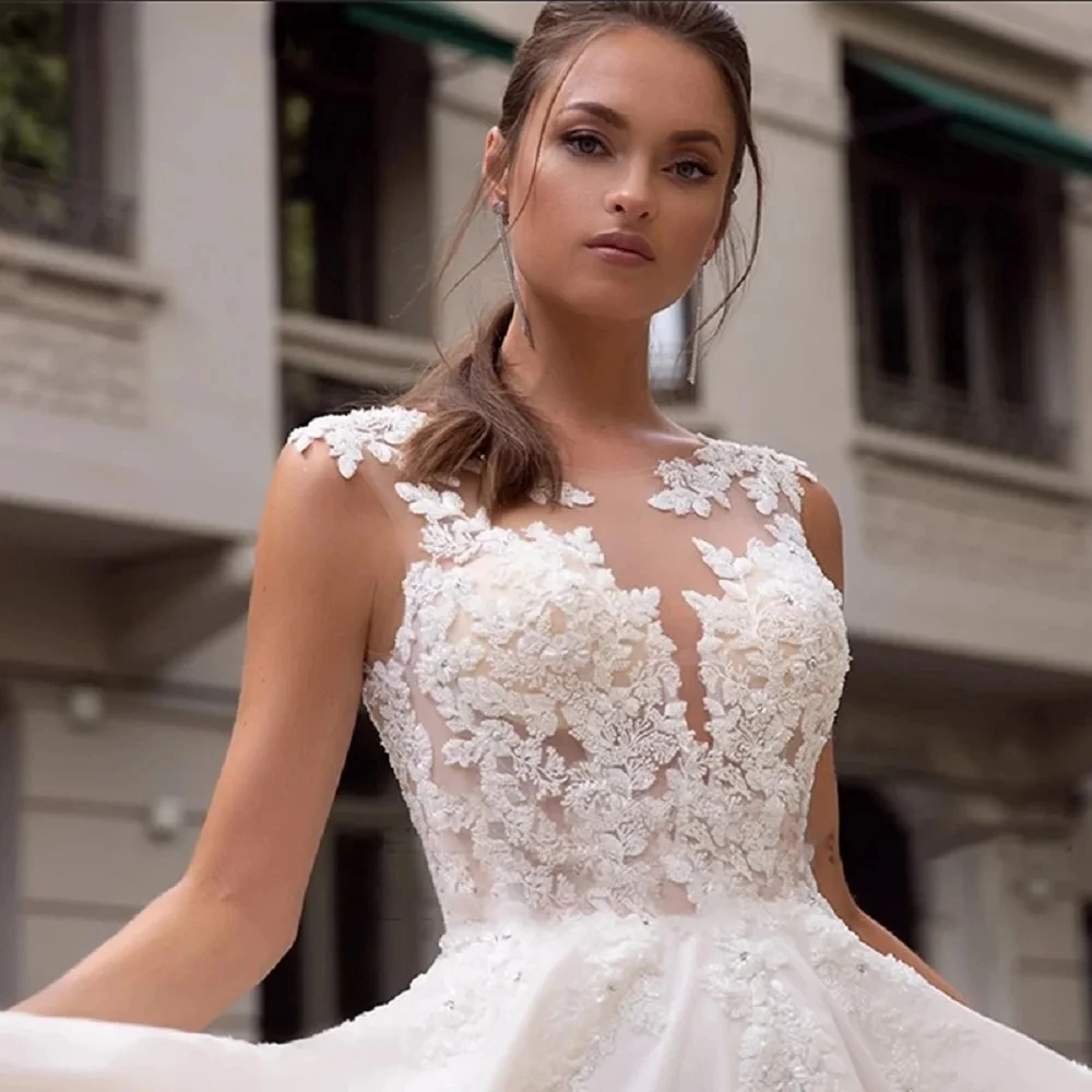 Abiti da sposa classici a-line o-collo abiti da sposa Appliques di pizzo abiti Vintage senza maniche Tulle eleganti abiti De Novia 2024