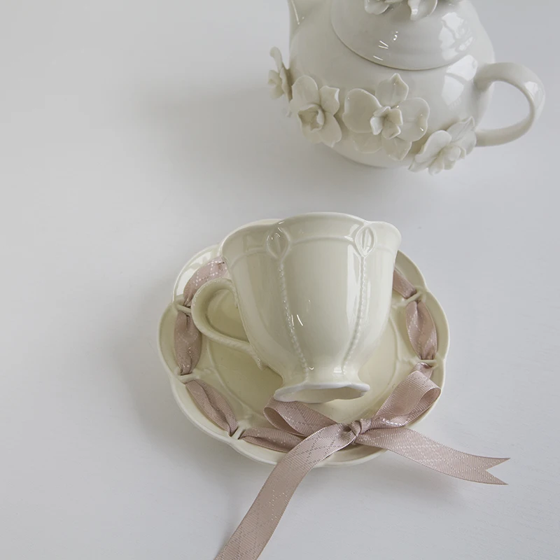 

Wedding theme layout export single European cream ceramic popular ribbon knot coffee cup milk pot cake plate