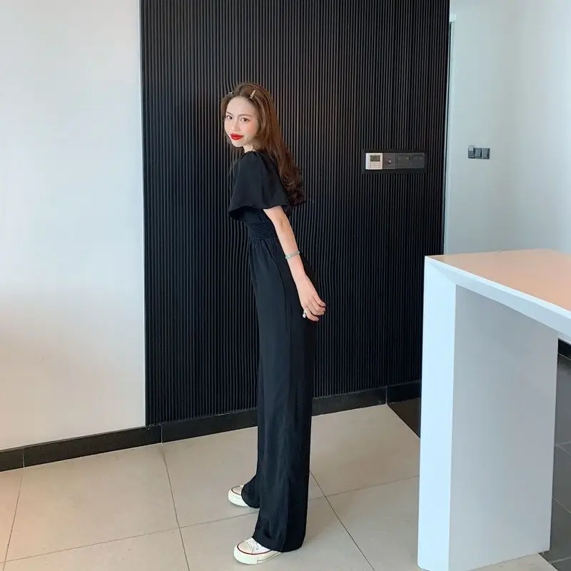 Tute a maniche corte con spalle scoperte Tute da donna eleganti con pieghe in vita Tuta dritta da donna con scollo quadrato senza schienale Estate nuova