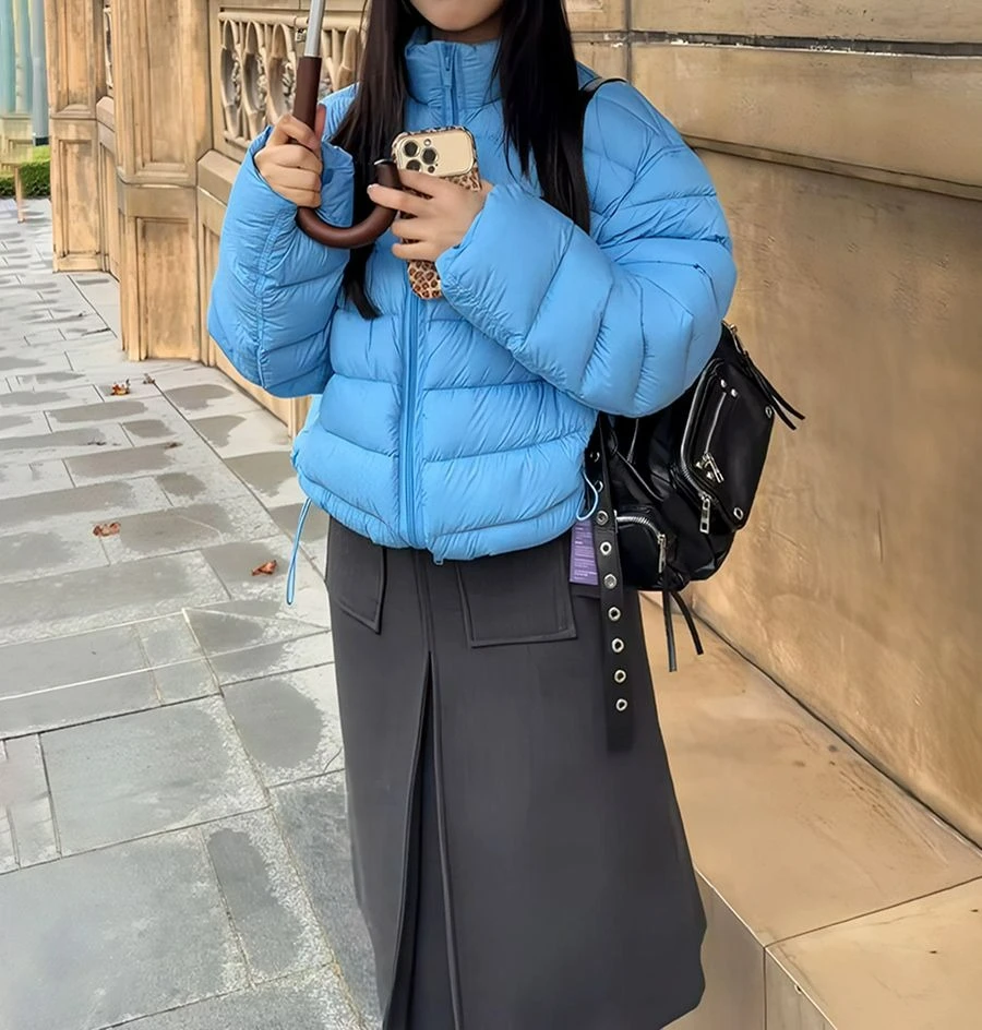 Col montant bleu court coton vêtements vêtements pour femmes hiver 2025 nouveau tempérament mince polyvalent pain vêtements veste