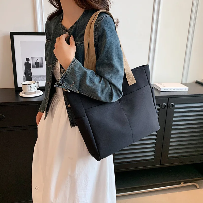 Minimalist Lightweight White Women Tote Bag, Large Capacity Shoulder Tote with Side Pockets Brown Handles for Everyday Carry