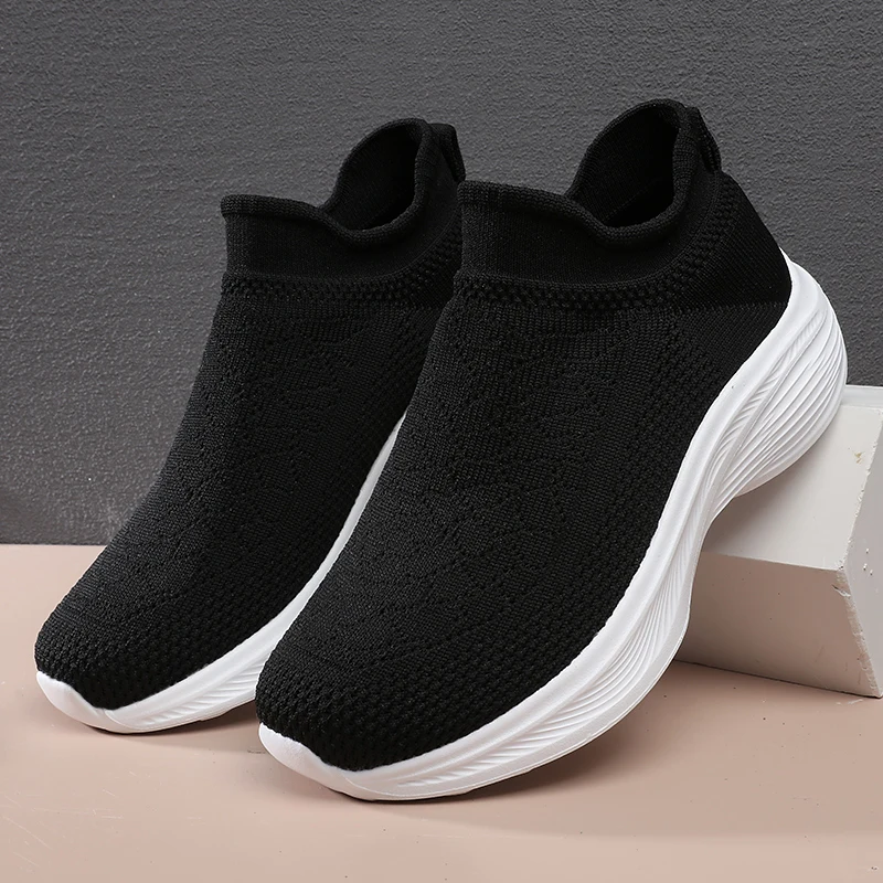 A pair of youth slip-on sock casual shoes, full breathable knit upper, flexible shock-absorbing sole for all-day wear KM-062
