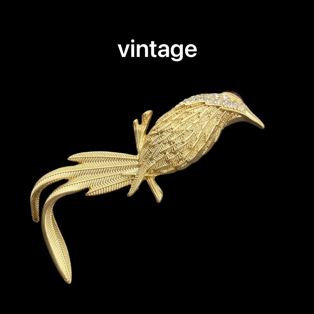 Vintage is a small, exquisite, and minimalist Phoenix brooch
