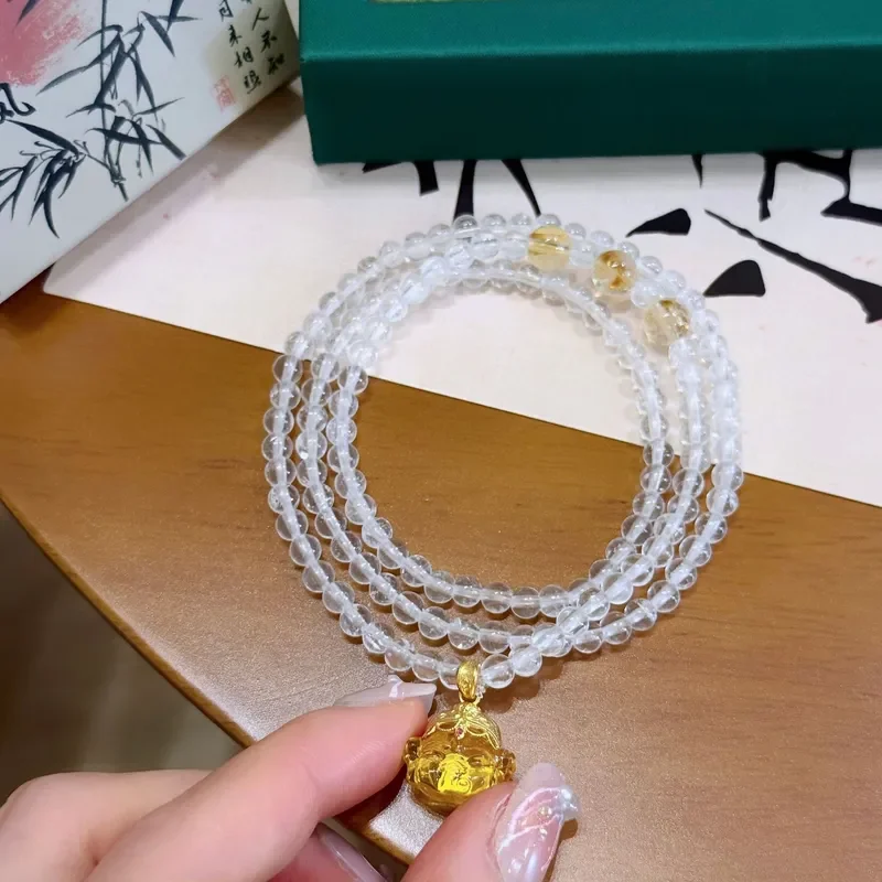 Jindian has the same natural white crystal yellow tower crystal entanglement bracelet, light luxury and high-end sand gold