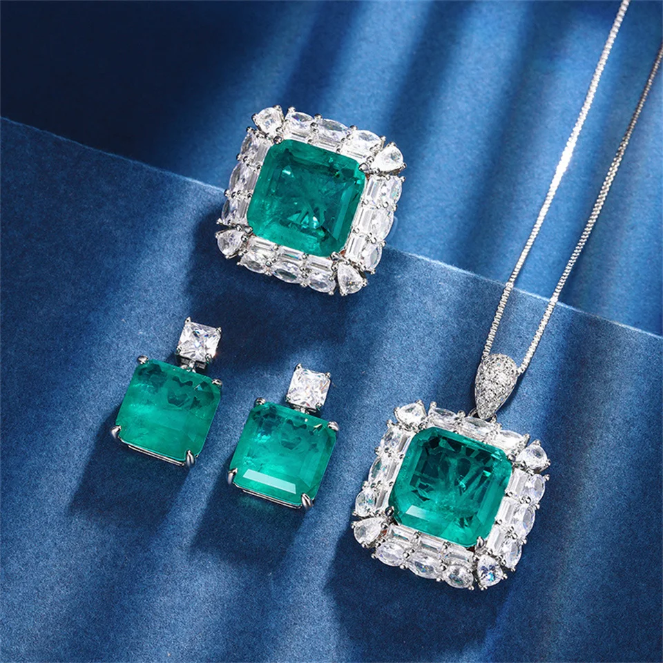 

Emerald Princess Jewelry Set For Women Diamond-encrusted Green Gemstone Necklace Ring Earrings Set Niche Stainless Steel Jewelry