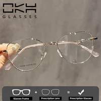 OKH, gafas graduadas con montura de ojo de gato para mujer, miopía, venta al por mayor, nuevo exquisito marco pequeño de seda dorada con diseño hueco