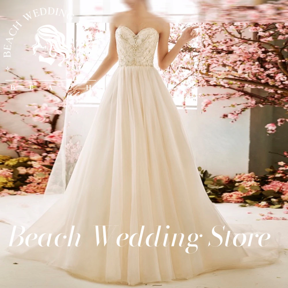 

Beach Customized Sweetheart Empire Sleeveless Sweep Train Floor Length Buttons Backless Champagne High quality Wedding Dress