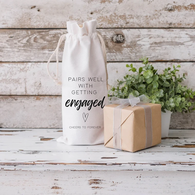

Pairs Well with Getting Engaged Cotton Wine Bag Engagement Wine Gift Bag Wedding Bachelorette Party Table Decor Bride To Be Gift