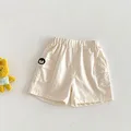 beige shorts