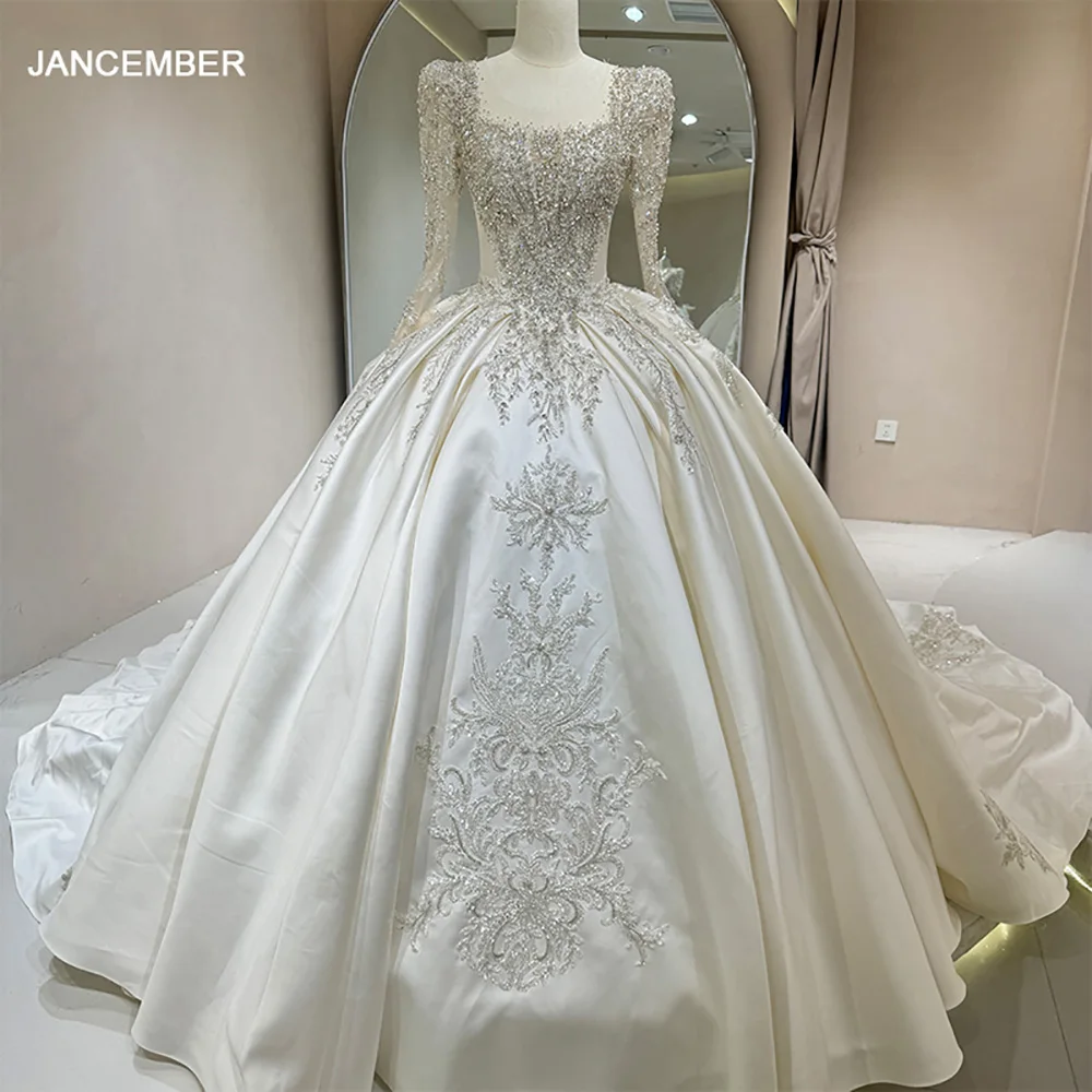 Charmante O-hals Trouwjurken Kant Baljurk Lange Mouwen Knoop Bruidsjurk Hof Trein vestidos de novia boda Aangepast