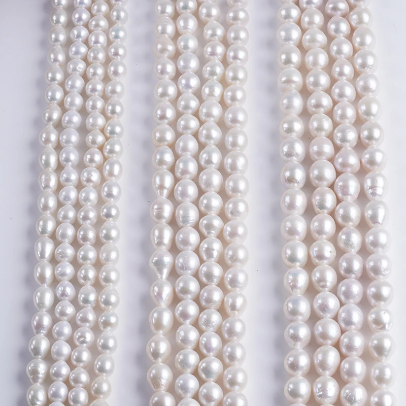 

9-11mm/11-13mm/12-15mm White Edison Rice Shape Cultured Freshwater Pearl Strands Wholesale for Jewelry Making