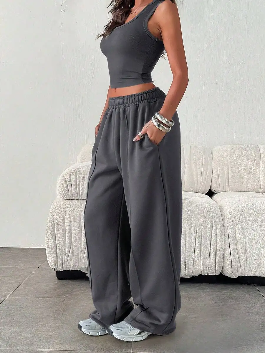 

Женские свободные однотонные спортивные брюки с эластичной талией и карманами