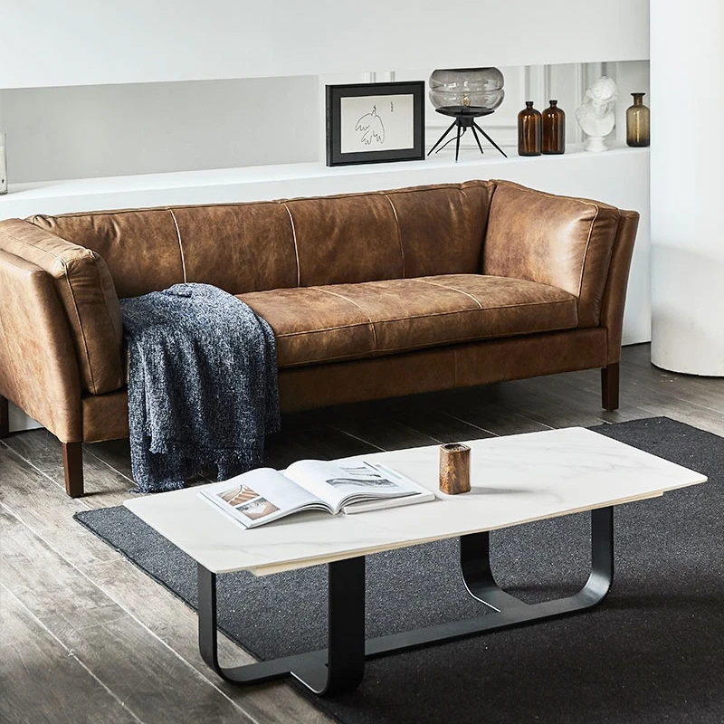 The first floor cowhide leather sofa combination small apartment living room for three people.