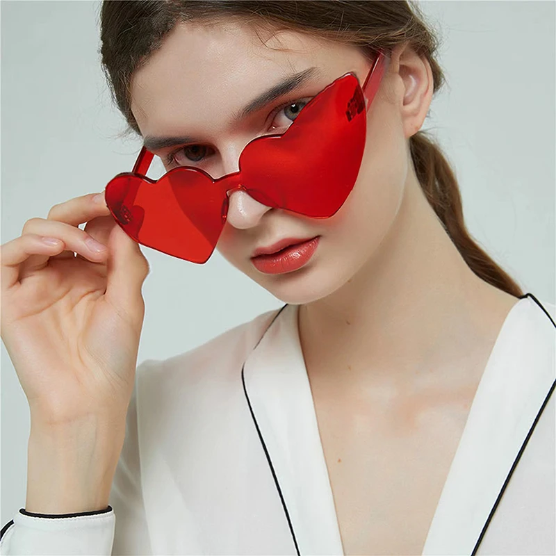 New Fun Party Jelly Color Frameless Heart Shaped In Heart Loving Sunglasses For Women One-piece Glasses Dazzling Color Glasses