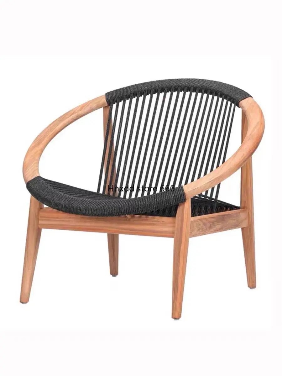 

Single solid wood lounge chair rattan Nordic balcony round log Nordic outdoor courtyard