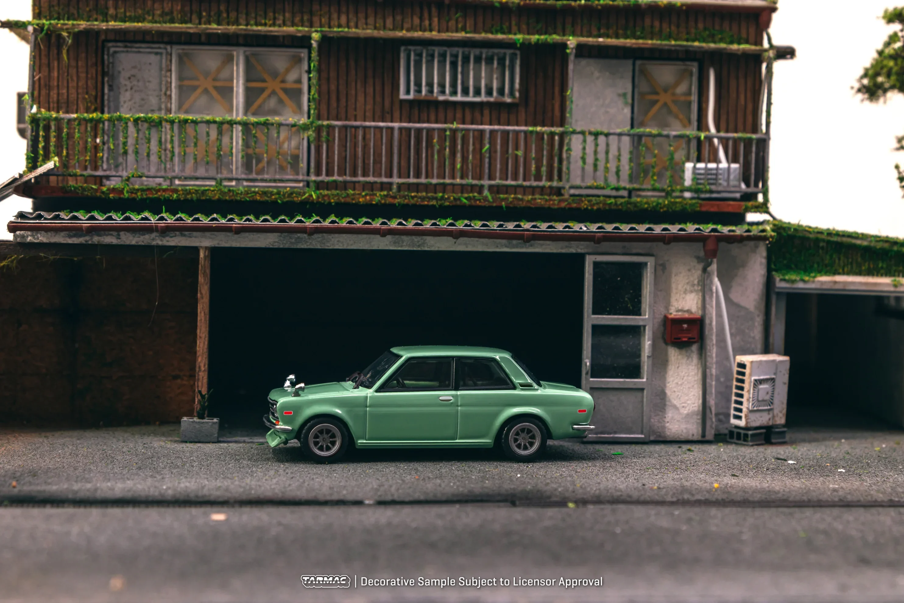 

Tarmac работает 1:64, модель автомобиля Datsun 510, цвет зеленый