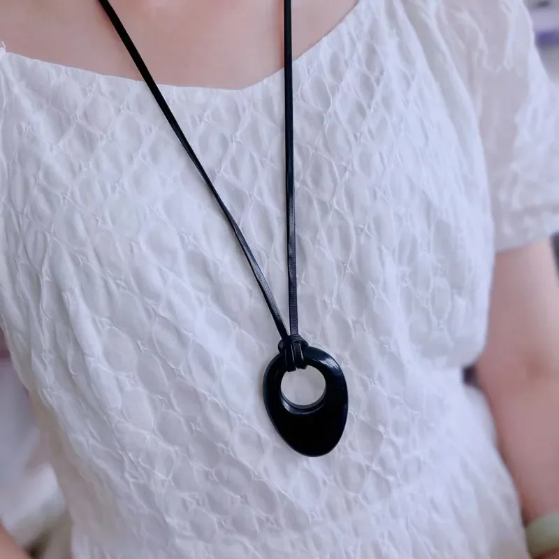 Black eccentric buckle necklace female blogger same niche design high personality long irregular obsidian necklace