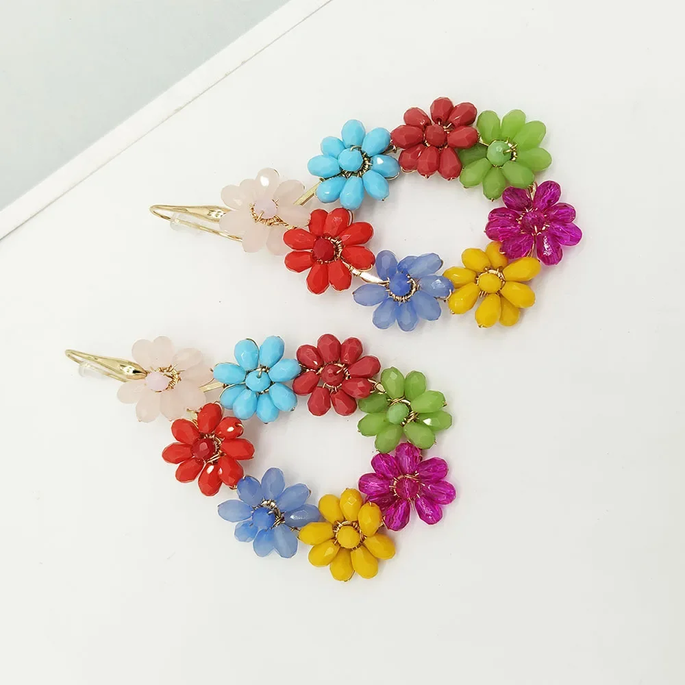 Beaded earrings Water drop Flower Originality Hand knitting Crystal Bohemia Tide Simple Alloy Rice bead earrings