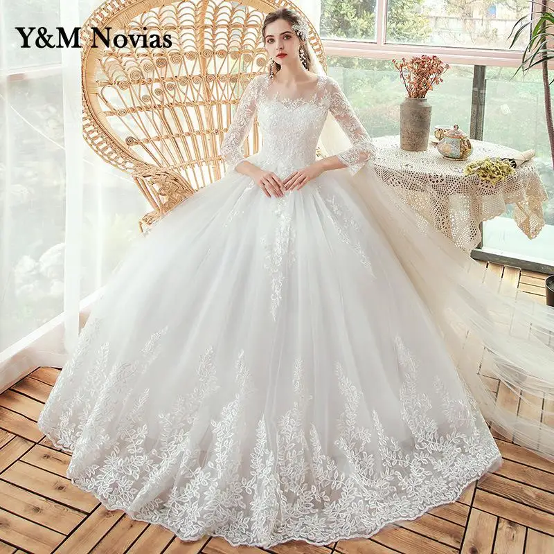 Muślin Vestidos De Novia w nowym stylu O-Neck Plus rozmiar suknia ślubna rękaw 3/4 kobiety koronkowe aplikacje suknia ślubna typu princeska