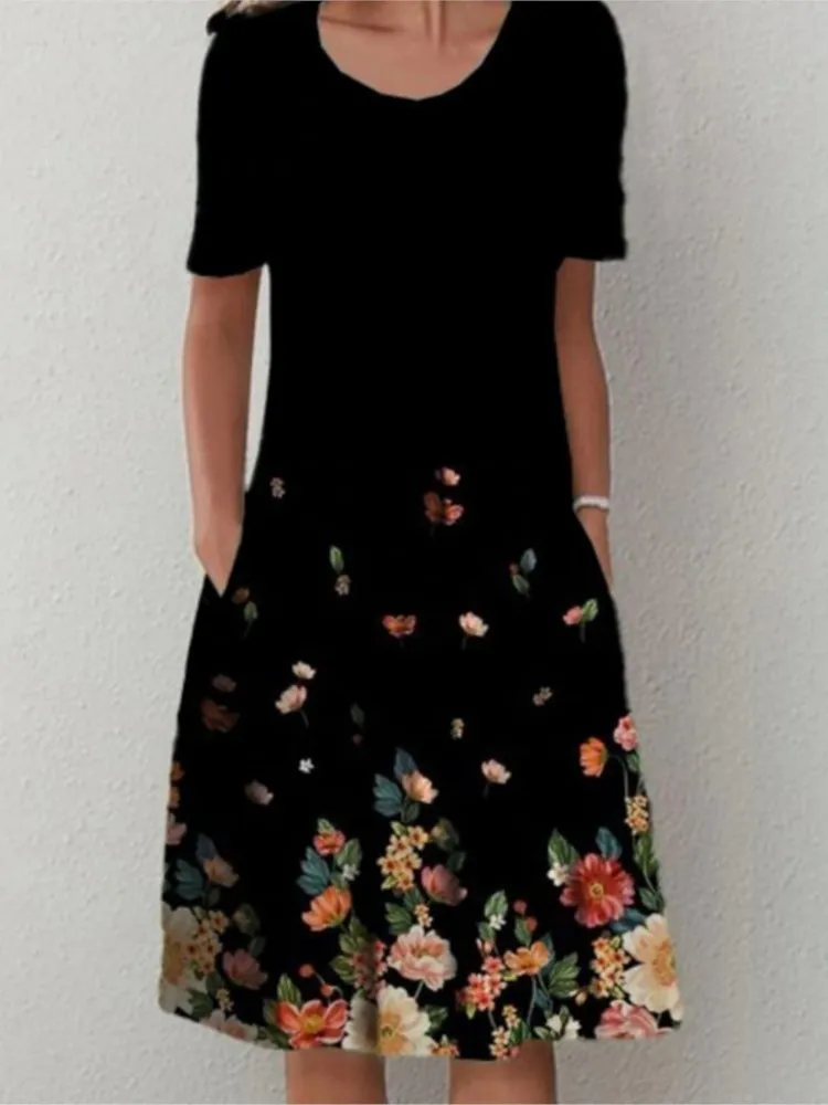 夏のファッション自由奔放に生きる花柄ポケットミディドレス女性のための O ネック半袖カジュアルルーズドレス女性の婦人服