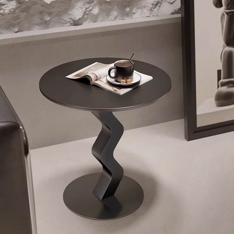 Modern simple small coffee table wrought iron light luxury art high-end corner table creative sofa rock slab round edge table