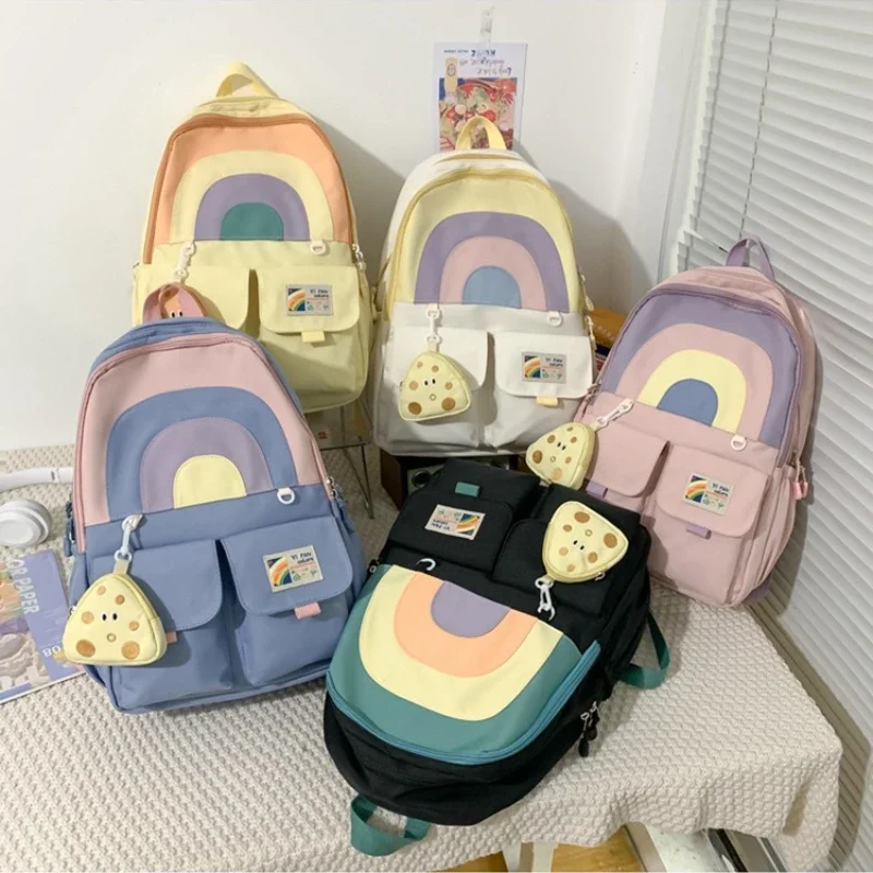 Mochila escolar colorida para estudiantes escolares femeninas, mochila escolar japonesa Simple de gran capacidad con corte de arcoíris y colgante de monedero de queso