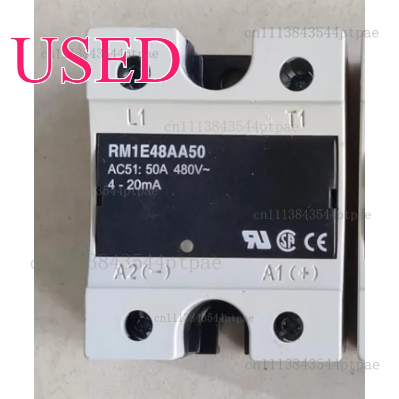 A solid state relay: rm1e48aa50: 4-20ma, 4-20ma current control input, ac480v 50a ac output. (real picture taken)