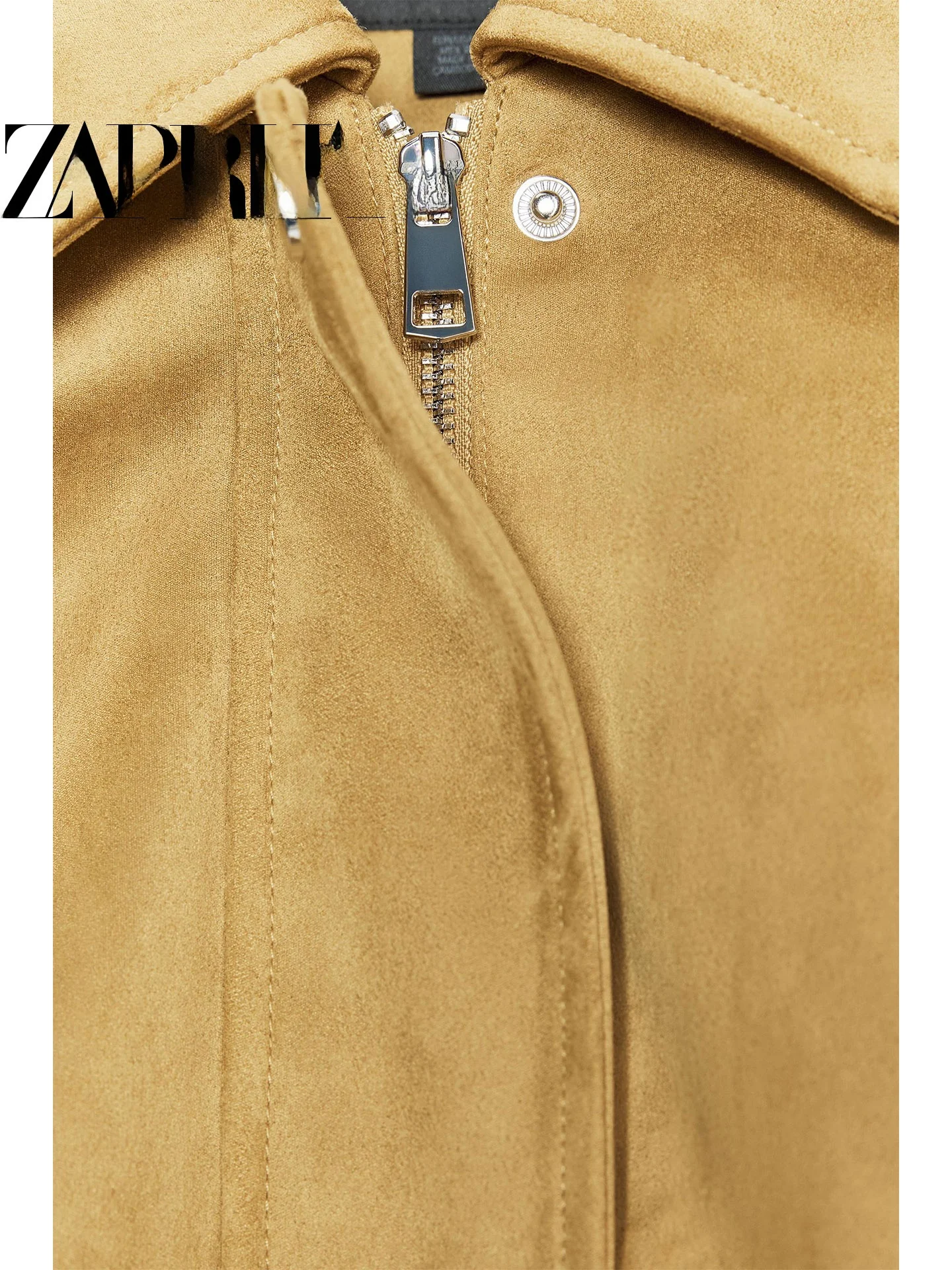 عارضة Sle المرأة الطيار Jaet ort طول فو الجلد المدبوغ تأثير الربيع 2026 Faion الاتجاه فضفاضة تناسب طويلة Sve زر إغلاق