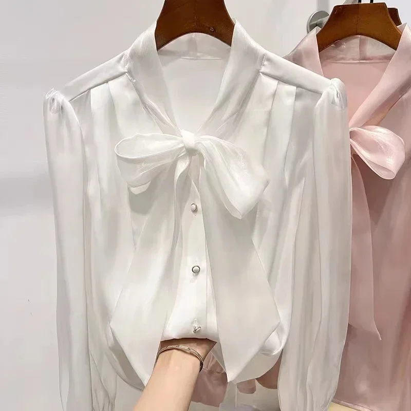 เสื้อชีฟองผู้หญิง แขนยาว แต่งริบบิ้น เสื้อผู้หญิงสไตล์เกาหลี แฟชั่นเสื้อเชิ้ตและเสื้อเบลาส์ ฤดูใบไม้ร่วง 2024 เสื้อผ้าผู้หญิง