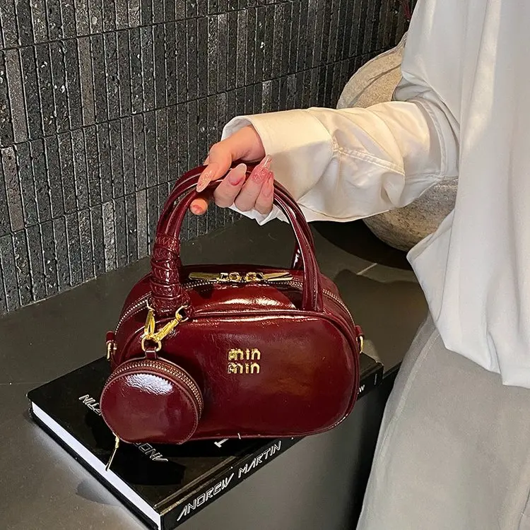 

2026 Spring New Korean Retro Light Luxury Small Round Bag Women's High Sense Casual Fashion Versatile Portable Messenger Bag