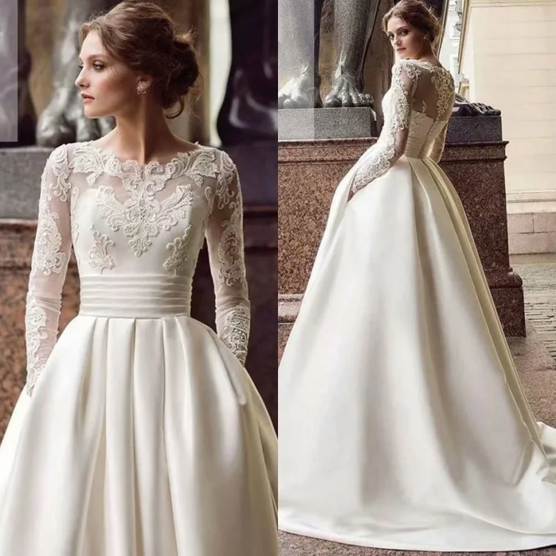 

New European and American style wedding dress with round neckline, lace, long sleeves, slimming and long design