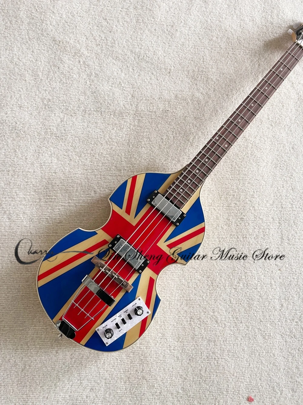 4 string beige bass guitar, thick bass bridge, semi-hollow bass guitar, flamed maple veneer, soap-bar pickups, maple neck