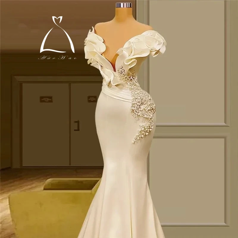 Dubai Arabia saudita perle abiti da sposa a sirena Sexy con spalle scoperte eleganti volant in raso avorio abiti da sposa Vintage Boho