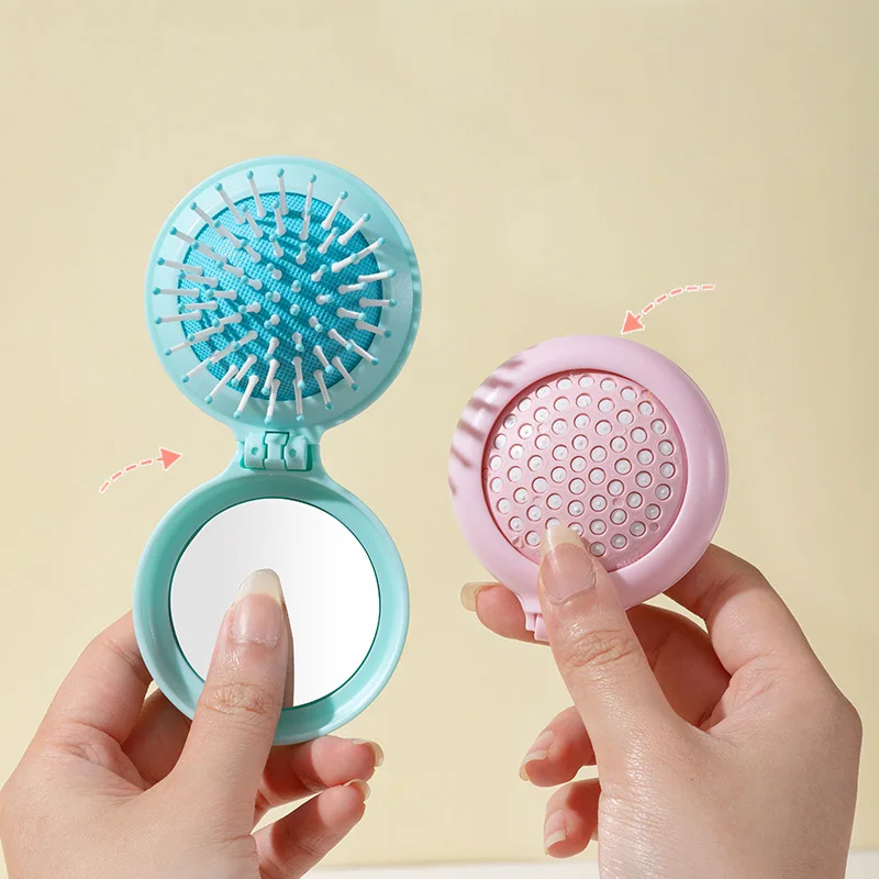 1 Stück tragbare, zusammenklappbare Haarbürste mit integriertem Spiegel, Kopfhautmassagekamm, ideal für Reisen und als Haaraccessoire. – Detail 3