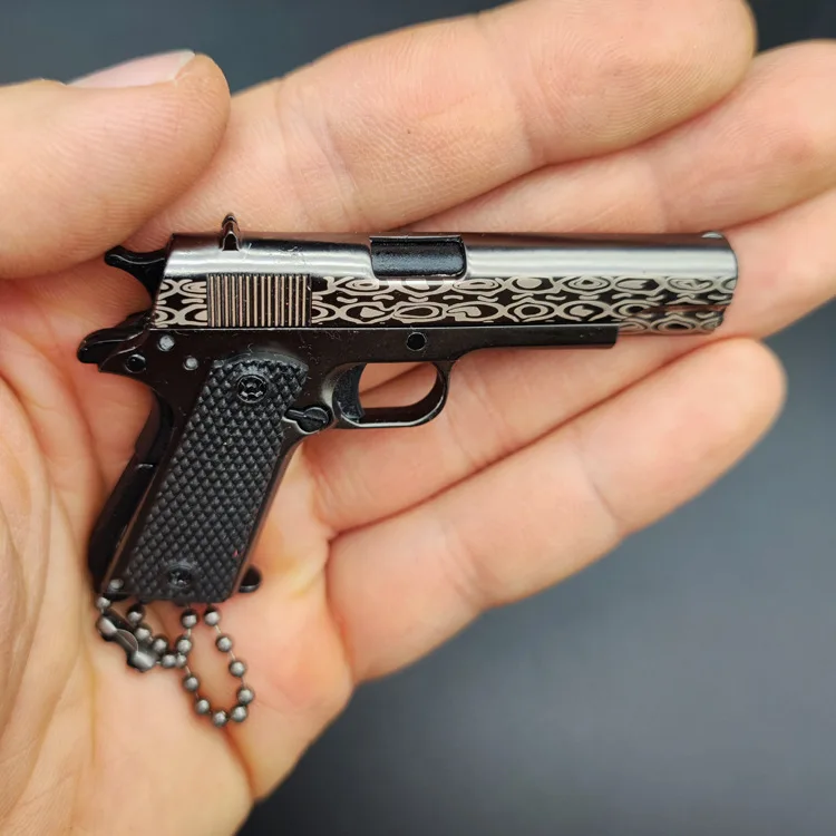 LLavero de pistola de Metal con estampado de Damasco, llavero de juguete con forma de arma de Metal 1911, modelo de pistola desmontable, 1: 3