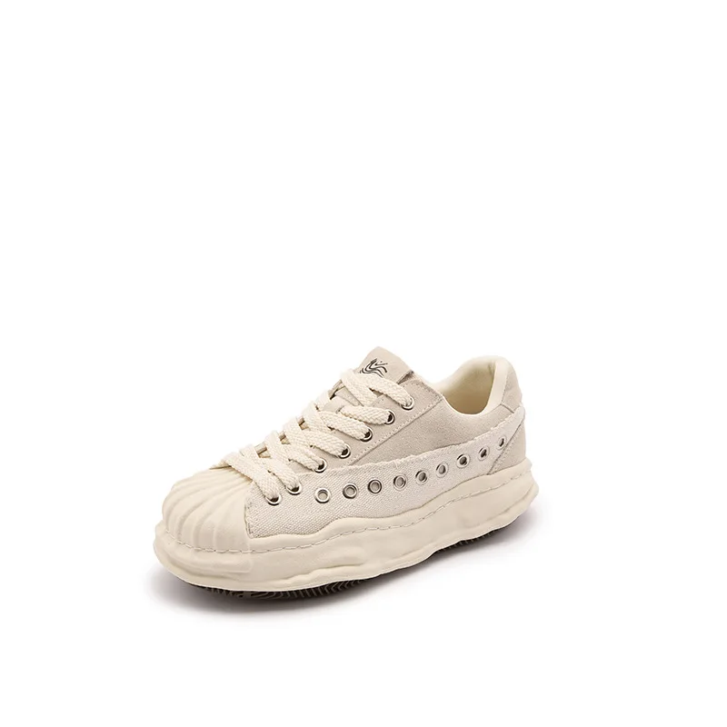 Canvas splicing shell head dissolving design men's and women's thick baseplate shoes casual versatile