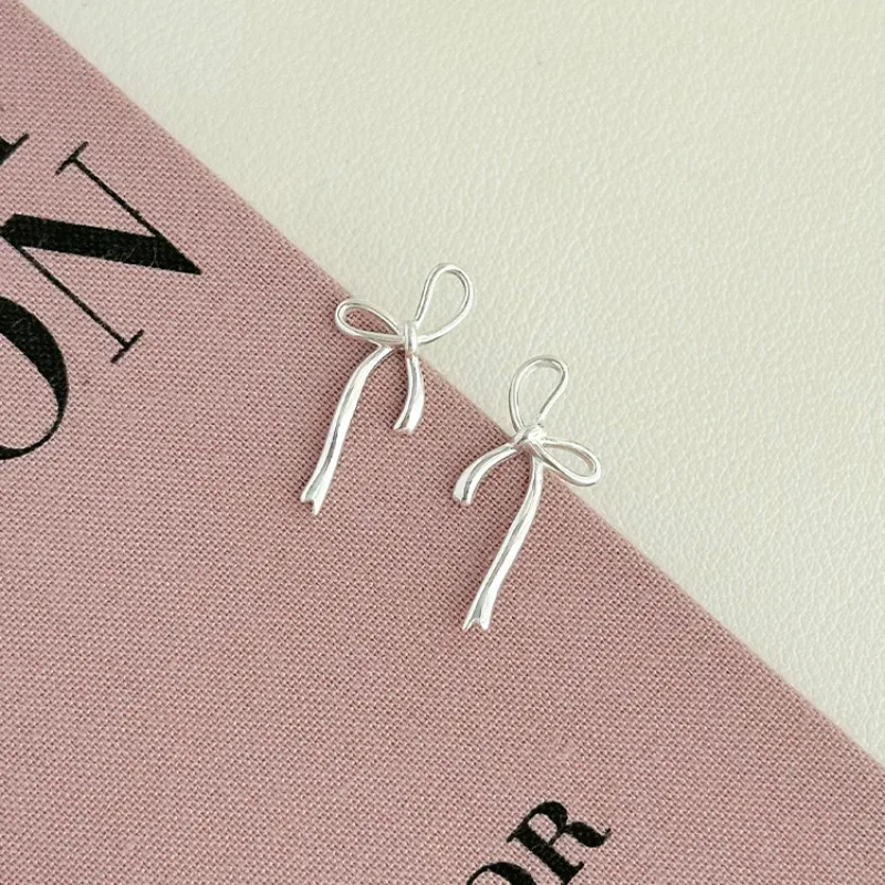 Fashion Sweet Cute Hollow Ribbon Bow Stud Earrings For Women Girls Simple Playful Silver Color Daily Jewelry Accessories