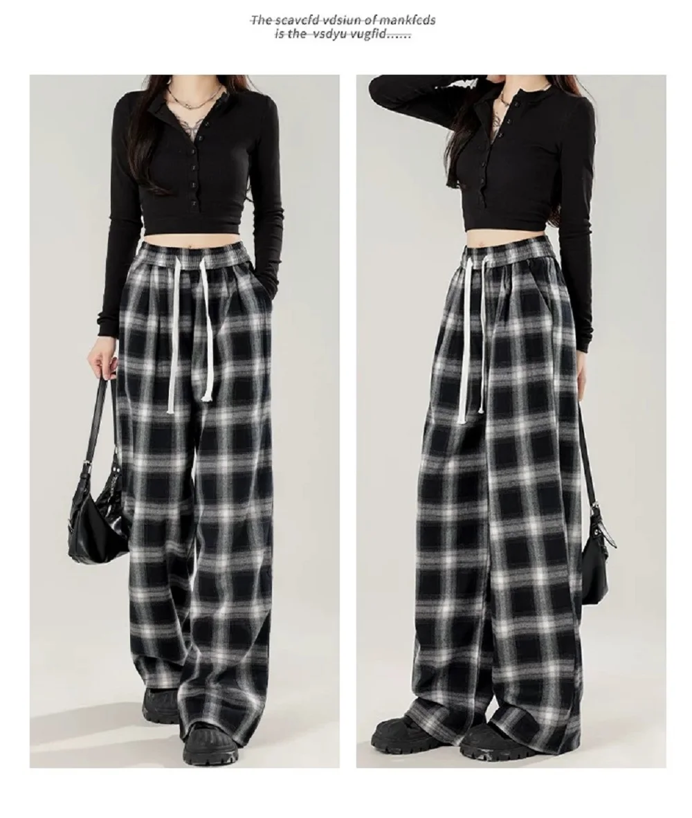 女性用の特大の黒い市松模様のスウェットパンツ,だぶだぶのカジュアルパンツ,伸縮性のあるウエスト,ポケット,学生,ユニセックス,ヒップホップ,ルーズフィット,ファッション