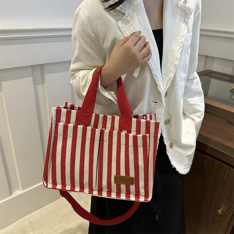 

Commuter large capacity hand-held tote bag with personalized striped shoulder bag trendy casual crossbody bag