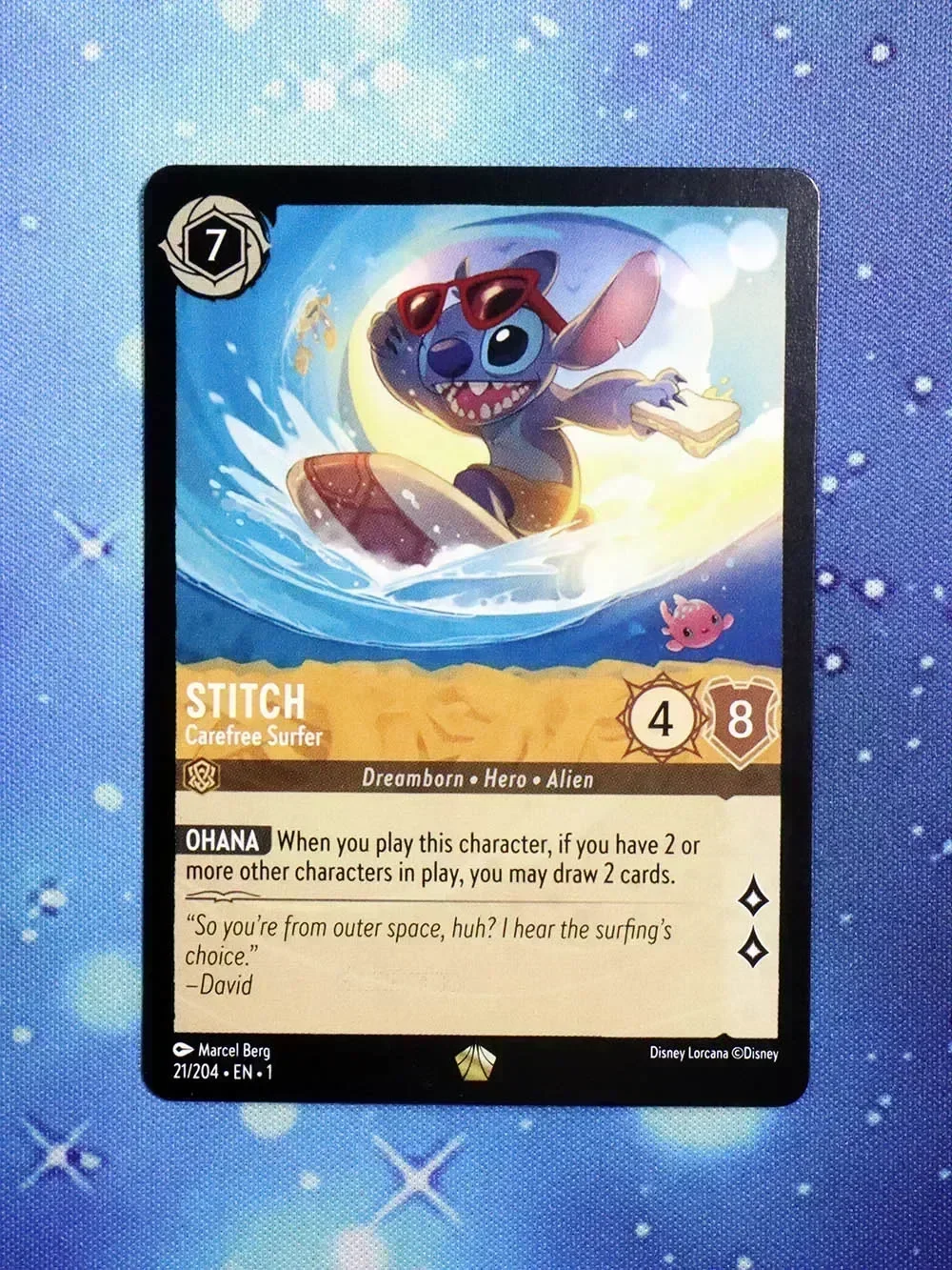 

Disney Lorcana Proxy The First Chapter Normal NoneFoil – Stitch – Carefree Surfer (21/204)TCG Game Cards